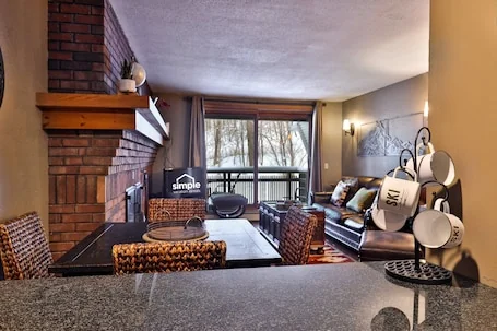 Ski-In/Ski-Out Sunrise Village Condo | 2BR, Fireplace, Pool