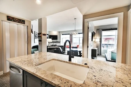 Your own balcony, full kitchen in Canyons Village by RedAwning