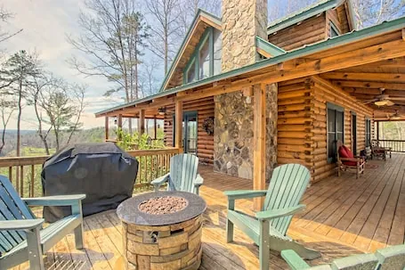 Secluded home on acreage with private hot tub, fireplace & wraparound deck