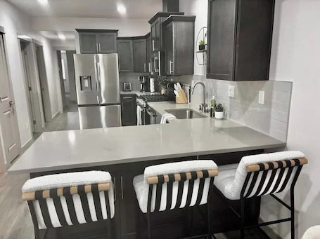 Stay in Boise’s coveted North End! This 3BR/2BA retreat with Hot Tub and Walking distance to Hyde Park and Camel’s Back Park close to Boise White Water park. E Bikes For Rent